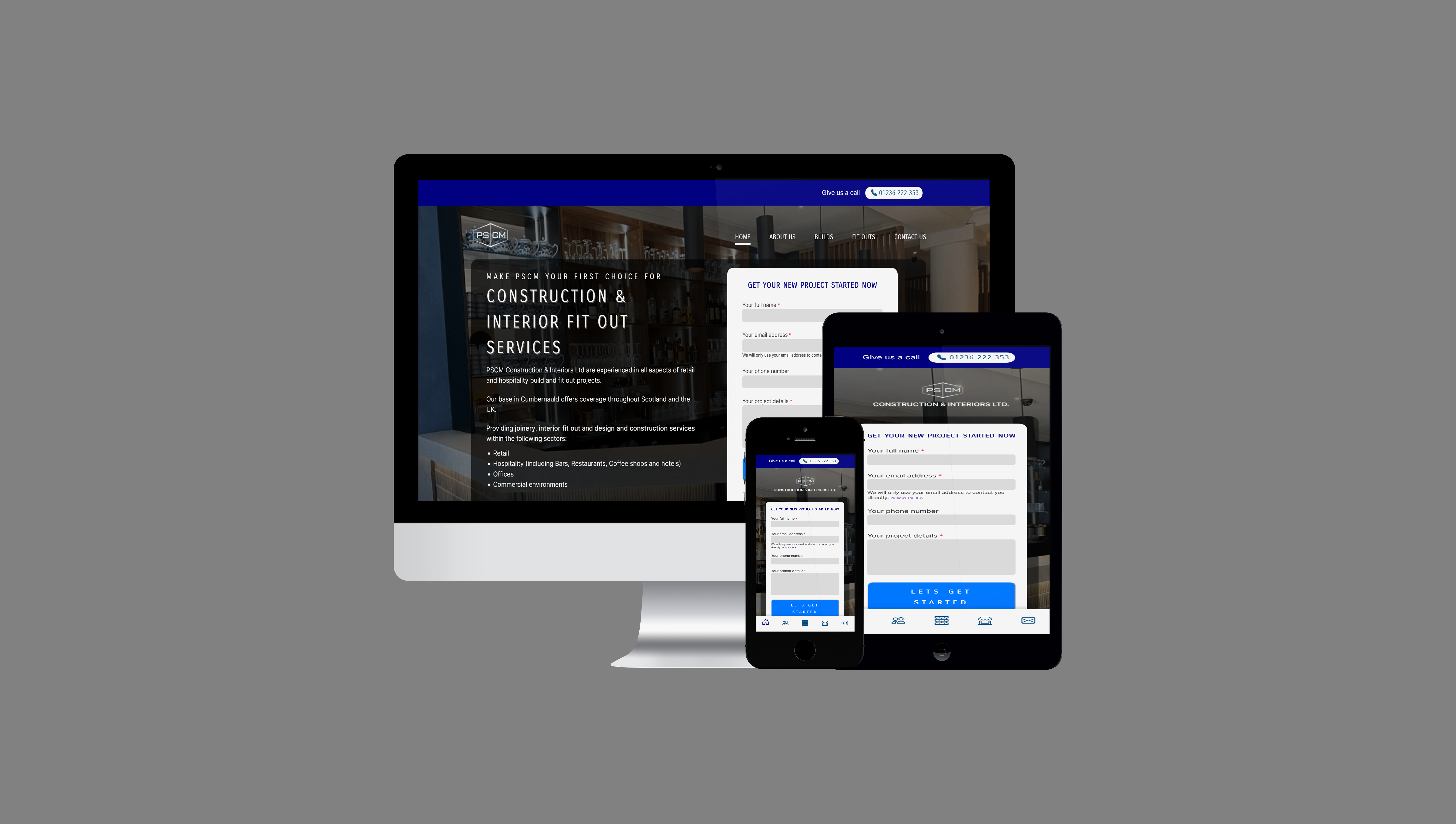 A mockup of the PSCM Construction & Interiors website on a laptop and mobile device